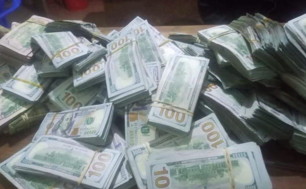 Teacher, 37, arrested airport after stash of foreign cash is found hidden in plastic bag inside his suitcase